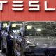Tesla recalls about half a million electric cars